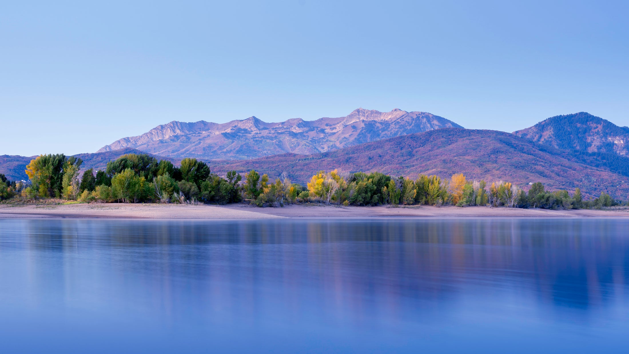 Pineview Reservoir with open water and mountains beyond the shoreline in northern Utah