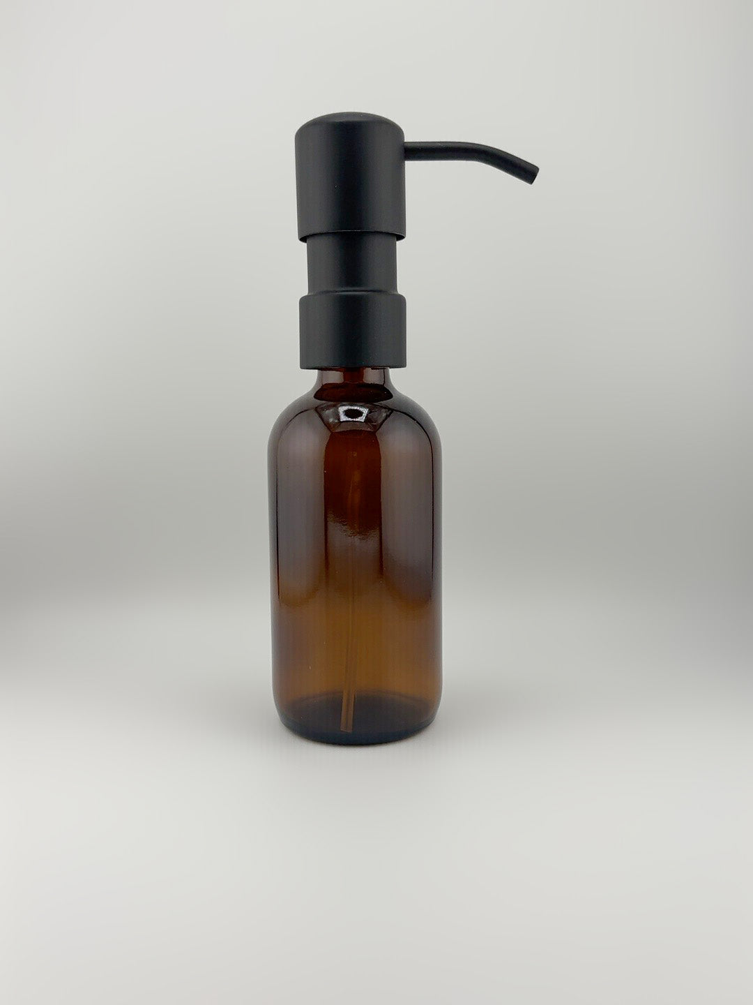 Black Pump Amber Bottle